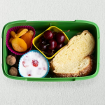 kids-healthy-food-lunchbox-with-challah-bread-dried-fruits_53876-142951